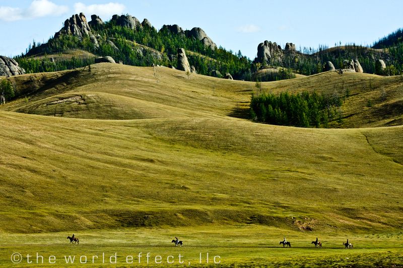 Nomadic hearders on horses. Terelj National Park, Mongolia